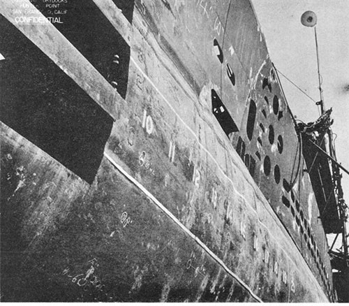 Photo 6-4; TUNNY (SS282). General view of port side, forward, showing deformation in way of single hull and forward trim tank.