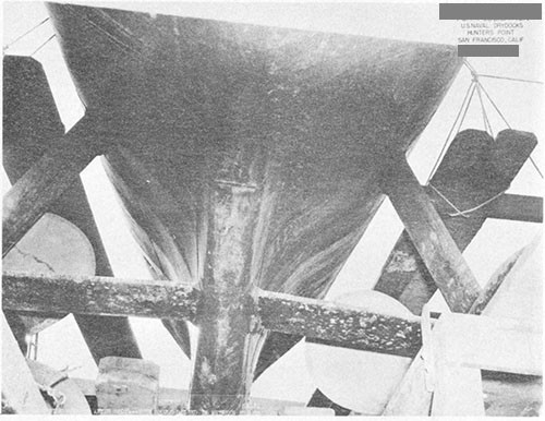 Photo 7-5: SALMON (SS182). View showing depressions in shell plating between frames in after trim tank, believed due to over-depth failure.