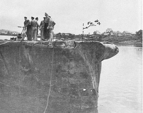 Photo 13-2: GROWLER (SS215). General view from starboard forward showing collision damage to bow.