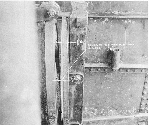 Photo 5-6: KINGFISH (SS234). View showing distortion to cover of 20mm ready service ammunition stowage located on the after bridge deck.
