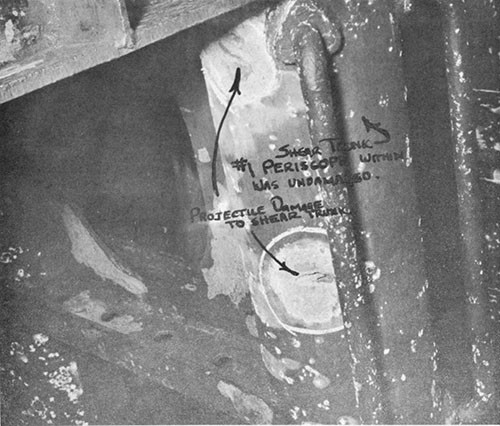 Photo 13-6: GROWLER (SS215). View showing damage to No. 1 periscope shear trunk in bridge "covered wagon".