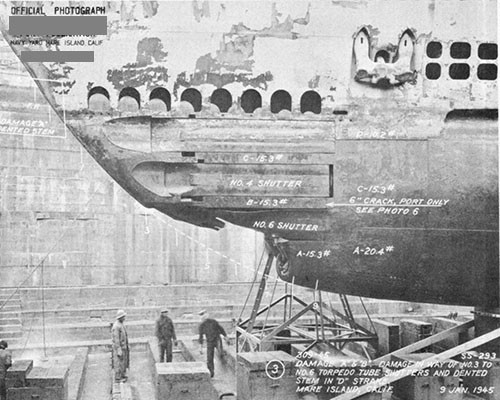 Photo 14-2: DRAGONET (SS293). View from port side showing damage "B" to torpedo tube shutters and fairing structure.