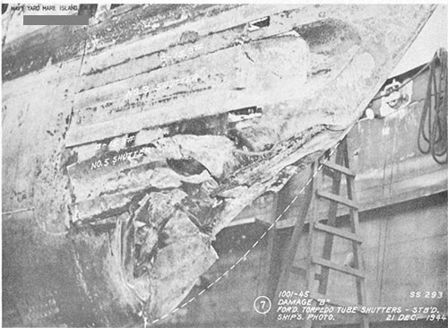 Photo 14-3: DRAGONET (SS293). View from starboard side showing damage "B" to torpedo tube shutters and fairing structure.