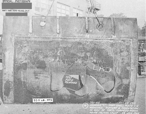 Photo 14-4: DRAGONET (SS293). View showing close detail of damage "C" to port pressures hull plating (37.5 pound HTS) of forward torpedo room. Small section of plate has been removed for test.