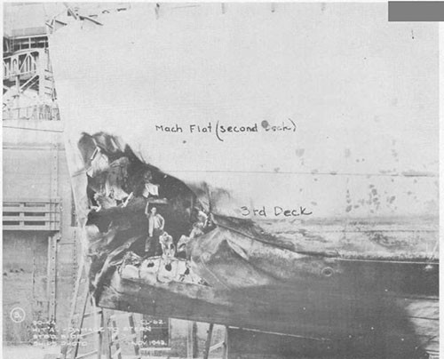 Photo 1: Bomb damage to stern, starboard side.