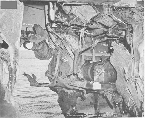 Photo 2: Bomb damage to stern. Starboard side looking aft and to port.