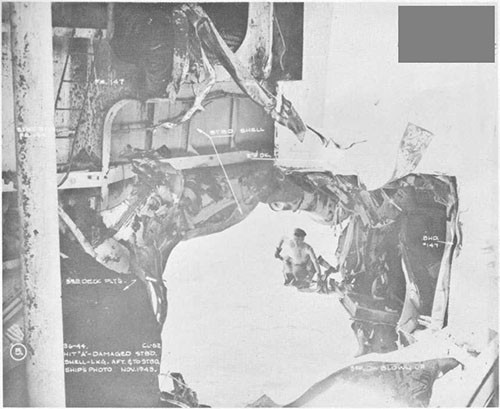 Photo 3: Bomb damage to stern. Looking aft and to starboard.
