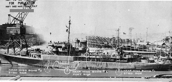 Photo 1: View of port side, showing locations of bombs.