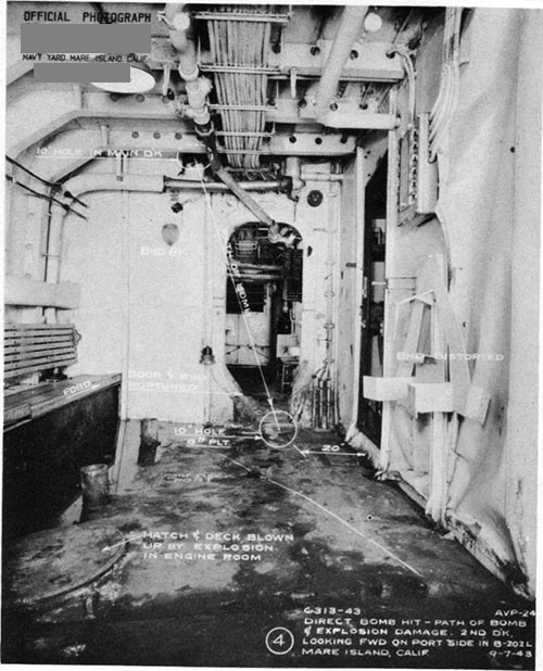 Photo 6: Path of direct hit bomb No. 3 through main and second decks. Note buckled deck and bulkheads due to detonation in engine room below.