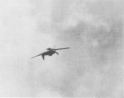 Photo J-1: Japanese suicide plane (ZEKE-52) just before striking deck.