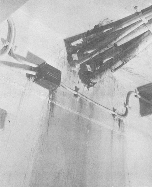 Photo 13: Compartment C-408-L showing electric cable stuffing tubes in bulkhead 113 which leaked.
