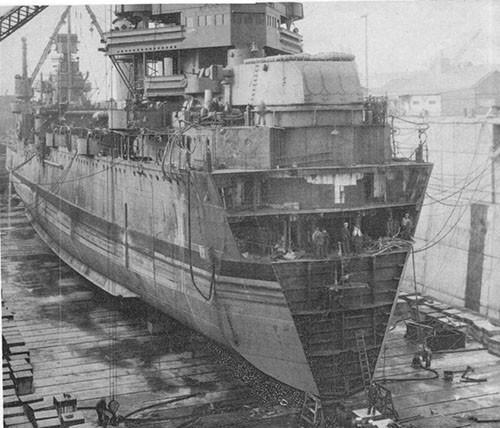 Photo 18: USS NEW ORLEANS - In dry dock at Navy Yard Puget Sound, 10 April,. 1943. Stub bow partially removed.