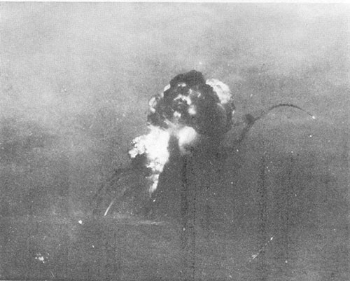 Explosion of forward bomb magazines initiated by torpedo hits. PRINCETON had sunk by the time smoke cleared.