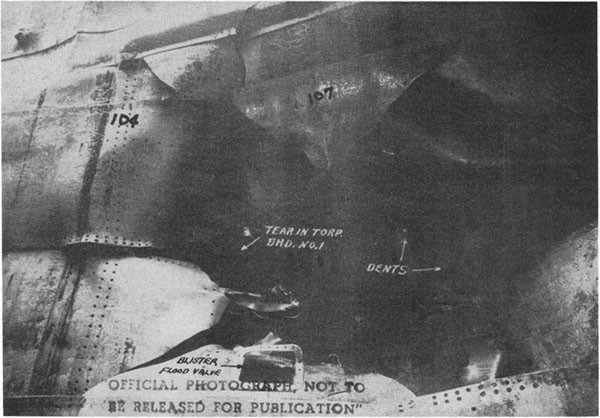 Photo 4: View from directly opposite the damage showing torpedo bulkhead No. 1 and the forward edge of the hole.