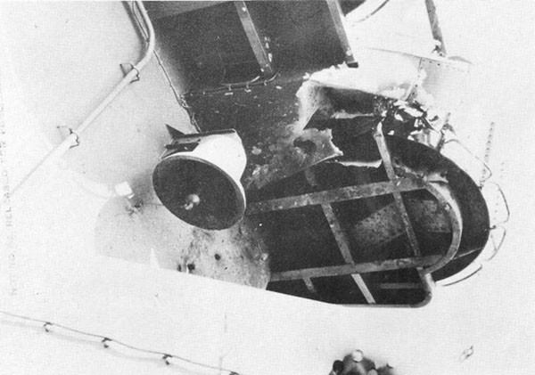Photo 38: Damage to bulkhead 81 and radio direction finder foundation possibly from detonation of hit No. 7.