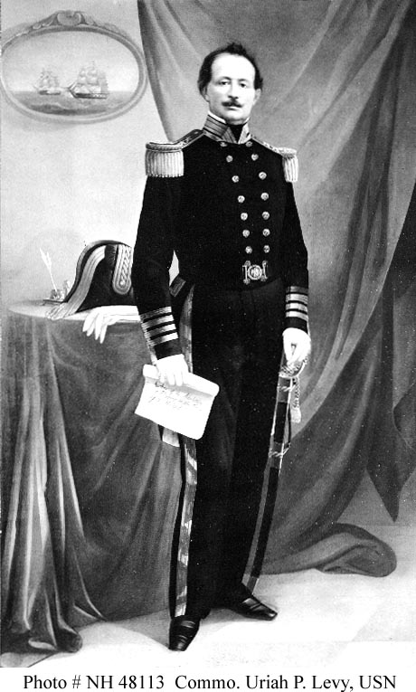 Commodore Uriah Phillips Levy, USN. Nineteenth-century albumin print of a painted portrait. It depicts Commodore Levy holding a scroll inscribed 'Author of the Abolition of Flogging in the Navy of the United States.'The uniform seen in this image...