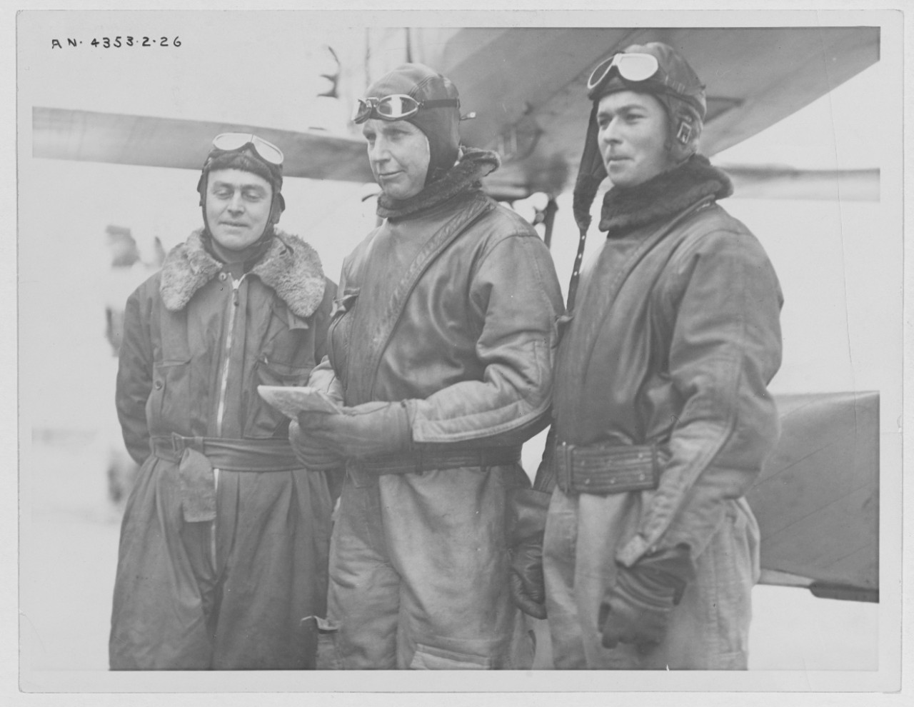 NH 119840 Left to right; Lieut. L. W. Curtain, Comdr, John Rodgers and ...