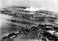 Battleship Row under attack by Japanese aircraft
