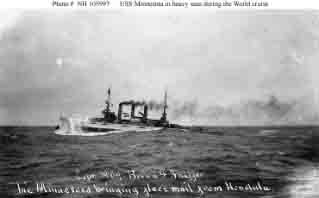 Minnesota pitching in heavy seas while bringing fleet mail from Honolulu, circa July 1908. Photo by Brown & Shaffer.