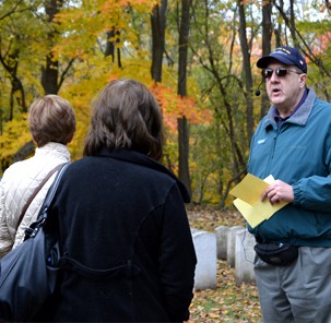 NMAS volunteer leading a NSGL cemetery tour.