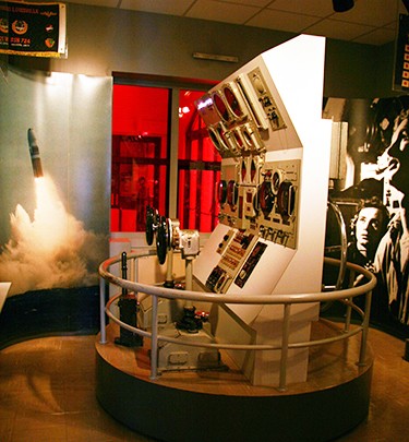 Link goes to the Educational Resources for the National Museum of the U.S. Navy.  Image shows the Submarine Room at the museum.  