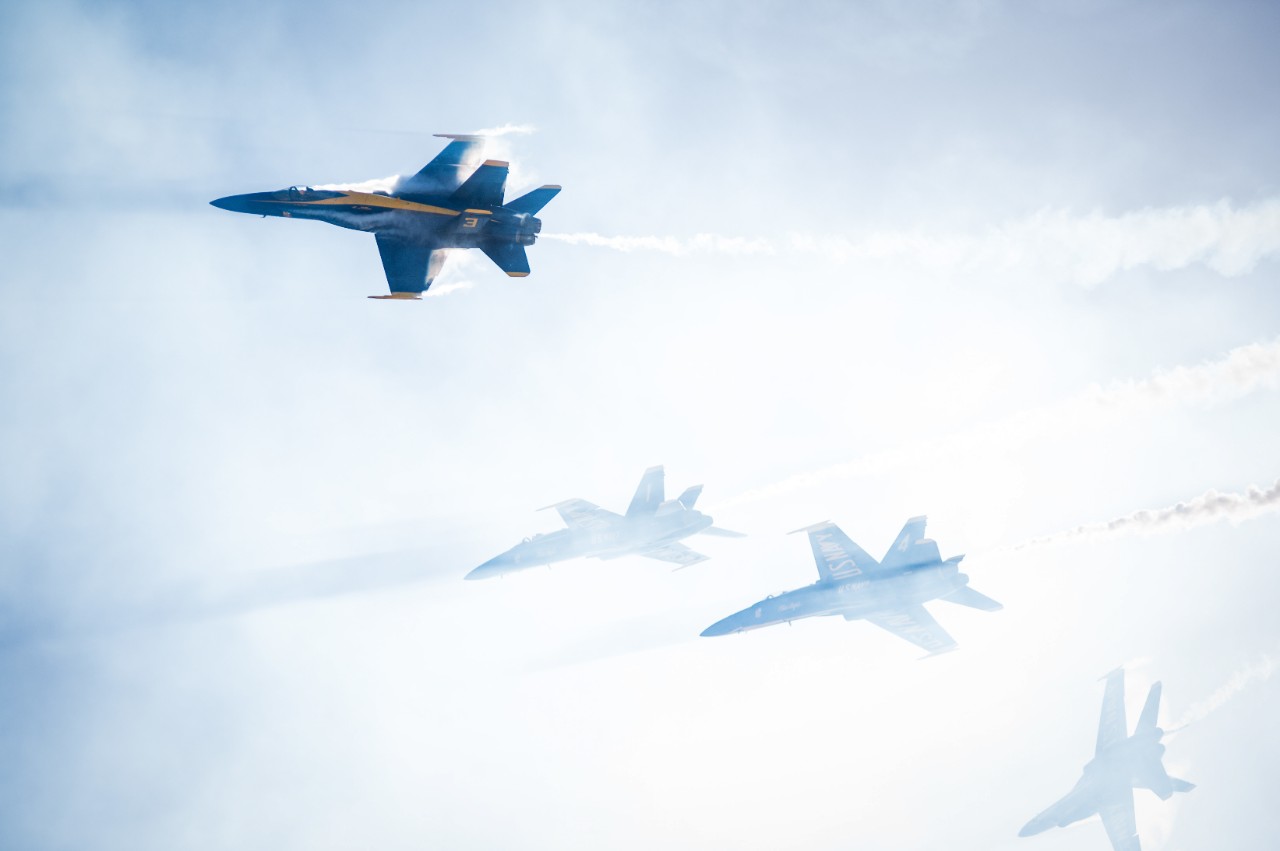 151003-N-NK714-117:   Blue Angels Maneuver:  High Speed Diamond Breakaway.   F/A-18 aircraft, October 2015.  U.S. Navy flight demonstration squadron, the Blue Angels, perform a high-speed diamond break-away maneuver at the Marine Corps Air Station Miramar Air Show, San Diego, October 3, 2015. The Blue Angels are scheduled to perform 68 demonstrations at 35 locations across the U.S. in 2015.  Photographed by Mass Communication Specialist 2nd Class Nolan Kahn.  Official U.S. Navy Photograph. 