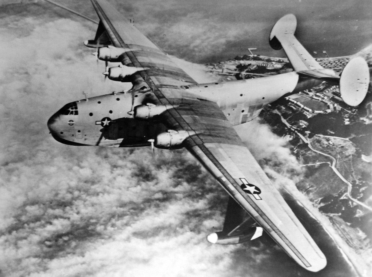 LC-Lot-9827-2: Martin JRM “Mars” aircraft, XPB2M-1, 1941. A close-up view of the Mars aircraft bound from San Francisco fully laden with materials vitally needed in the Pacific war period. Soon twenty more of these vast cargo ships of the air will be added to the fleet by NATS. Album from The Glenn L. Martin Company, Baltimore, Maryland, 1941. Courtesy of the Library of Congress. 