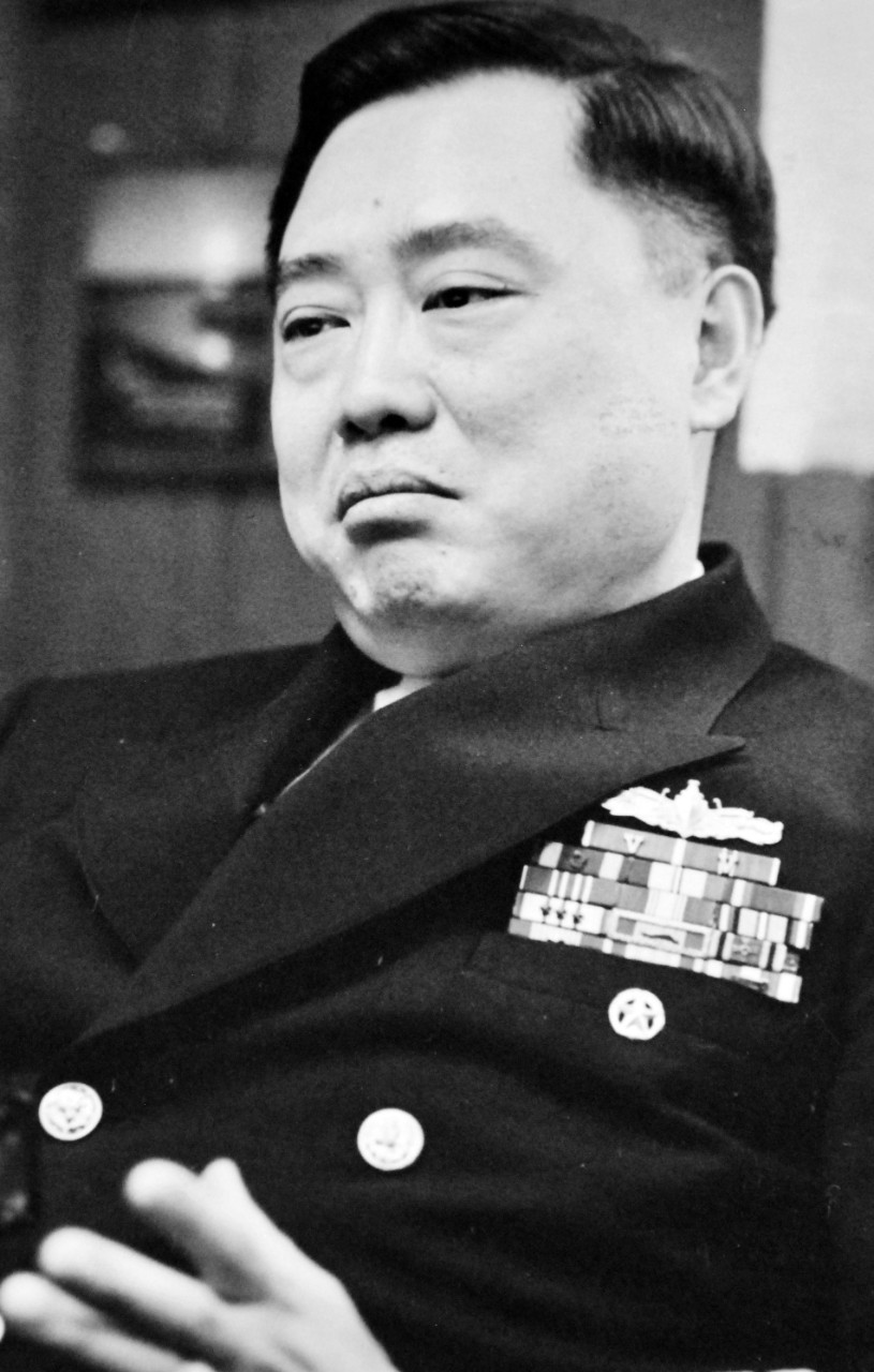 428-GX-USN-1171587:  Captain Ming E. Chang, 1977.   Pearl Harbor, Hawaii.  Captain Ming E. Chang, a Navy Captain born in Shanghai, China, is the skipper of USS Reeves (CG-24).  Photographed by PH2 Robert Weissleder, received December 1977.   U.S. Navy Photograph, now in the collections of the National Archives.  