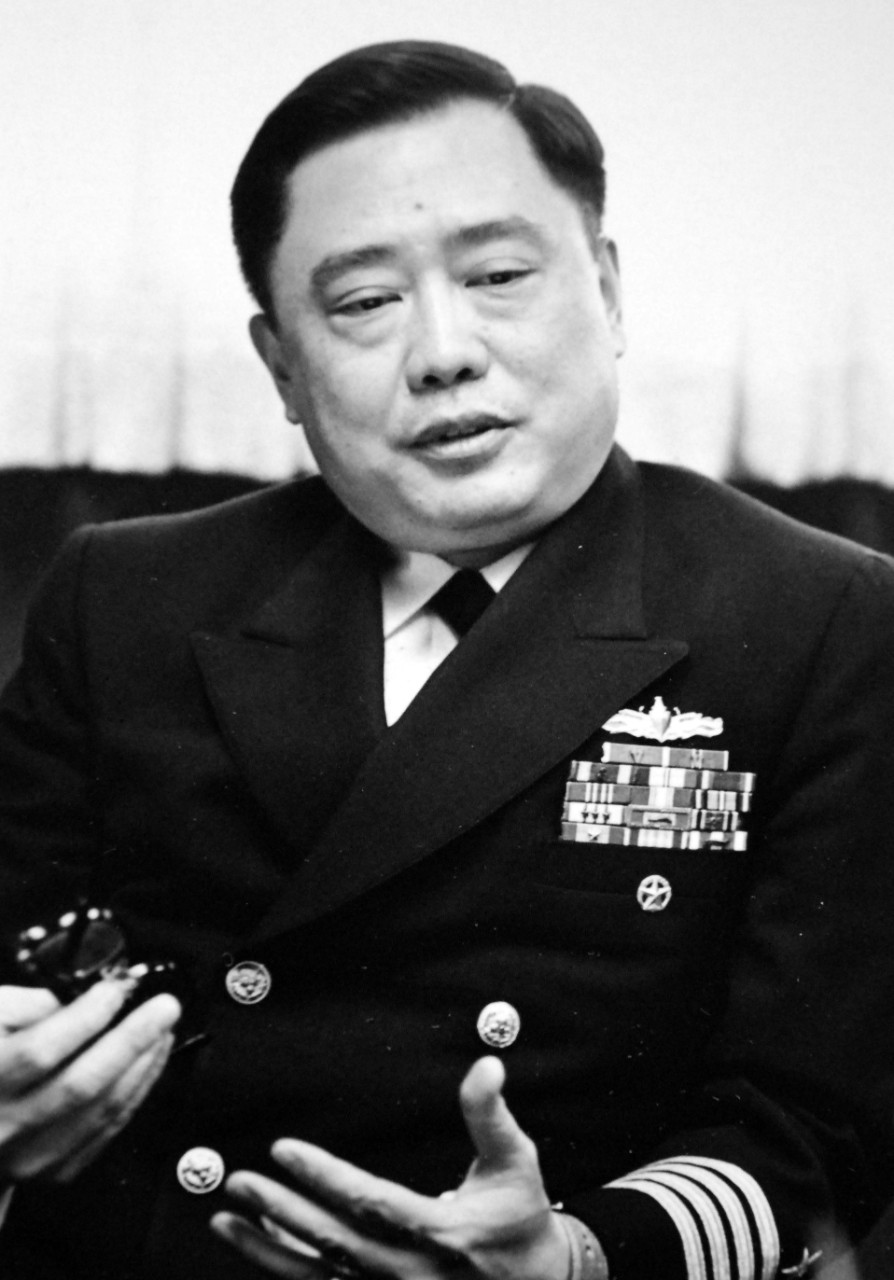 428-GX-USN-1171589:  Captain Ming E. Chang, 1977.   Pearl Harbor, Hawaii.  Captain Ming E. Chang, a Navy Captain born in Shanghai, China, is the skipper of USS Reeves (CG-24).  Photographed by PH2 Robert Weissleder, received December 1977.   U.S. Navy Photograph, now in the collections of the National Archives.  