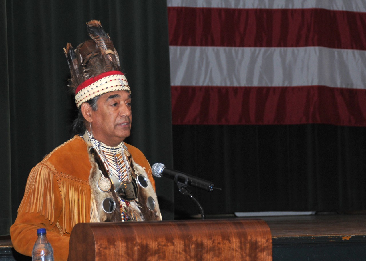 081125-N-7987H-069:   Native American and Alaskan Native Heritage Month, November 2008.   Chief Thomas "Two Feathers" Lewis of the Mehrrin Tribe thanks guest for attending the Native American Heritage month celebration on board Naval Station Norfolk, November 25. The theme for this event was "Living in Many Worlds" and included a history of the local Nottoway Tribe and traditional dance demonstrations. Photographed by Mass Communication Specialist 3rd Class Mandy Hunsucker.  Official U.S. Navy Photograph.  