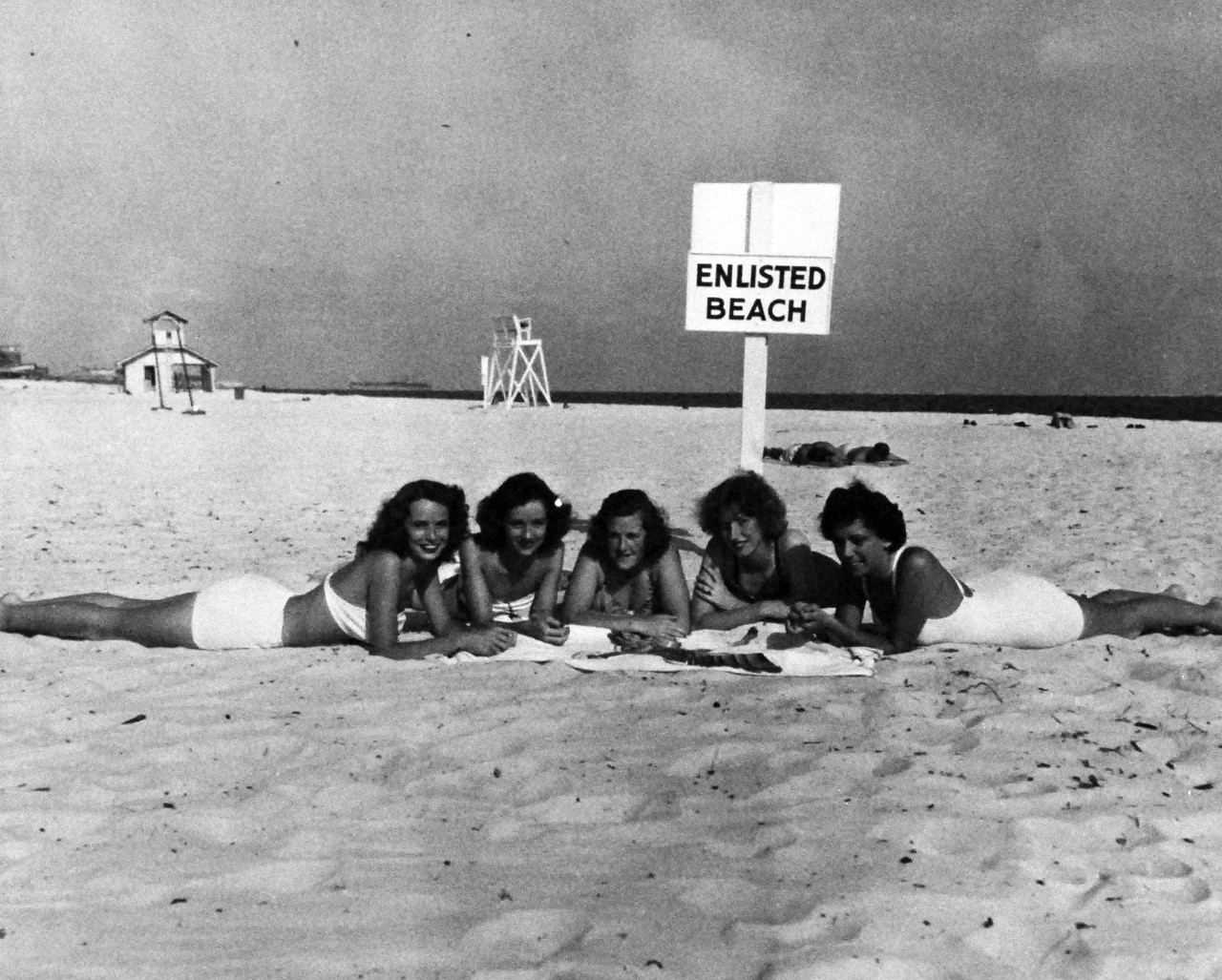 80-G-420872:   Activities of WAVE Reservists at Pensacola, Florida, October 1950.    WAVEs sunbathing on the beach, October 1950.  Photograph received 20 October 1950.   Official U.S. Navy photograph, now in the collections of the National Archives. 