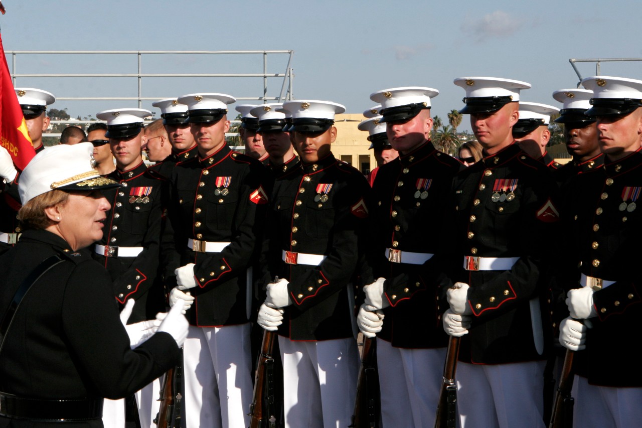 090307-M-7528O-546:   U.S. Marine Corps Brig. Gen. Angela Salinas, 2009.  Salinas, commanding general, Marine Corps Recruit Depot (MCRD) and Western Recruiting Region, talks to Marines with Silent Drill Platoon March 7, 2009, after their performance at MCRD San Diego, Calif. Salinas is commending the Marines for a job well done.  Photographed on March 7, 2009 by (Lance Cpl. Andrea M. Olguin.   Official U.S. Navy Photograph.   