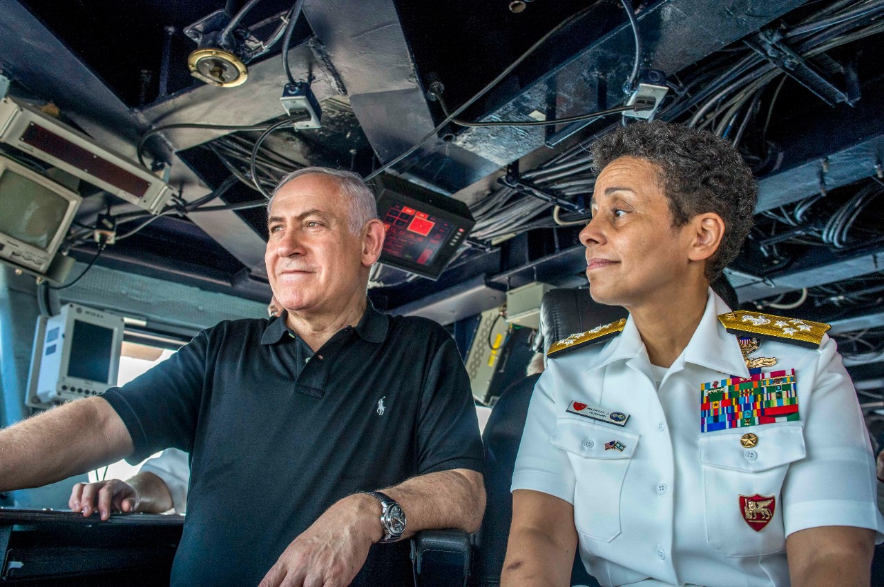 170703-N-AF077-899:  Israeli Prime Minister Benjamin Netanyahu, left, speaks with Commander, Naval Forces Europe, Adm. Michelle Howard, 2017.  They were discussing about U.S. military operations on the bridge of the aircraft carrier USS George H.W. Bush (CVN 77) during a visit to the ship at Haifa, Israel.   The visit was conducted to strengthen U.S.-Israel relations and the two nations commitment to stability in the region. The ship and its carrier strike group are conducting naval operations in the U.S. 6th Fleet area of operations in support of U.S. national security interests in Europe and Africa.   Photographed on July 3, 2017 by Mass Communication Specialist 1st Class Sean Hurt.  Official U.S. Navy Photograph.  