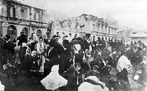 NH 1177:  Messina Earthquake, December 28, 1908.   Refugees waiting for transportation at Messina, Sicily.   Photographed in January 1909.   NHHC Photograph Collection
