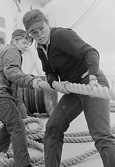 428-GX-N-1155872:  USS Sanctuary (AH-17).  Seaman Apprentice Anneliese Knapp, one of the fifty women assigned to the hospital ship, handles a line on the deck of the ship, March 1973.  Official U.S. Navy photograph, now in the collections of the National Archives. 