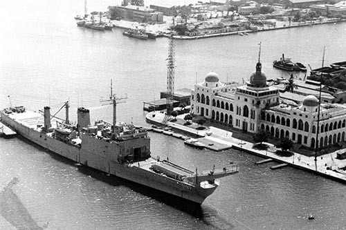 USS Barnstable Country (LST-1197) moored at Port Said, prior to her trip down the Suez Canal in late June.  The first U.S. ship to enter the canal since 1967, the LST served as the flagship for CTF-65 while at anchor on Lake Timsah near Ismailia.  Photographed by PH2 Robert Edmonson.   NHHC Photograph Collection, Navy Subject Files. 