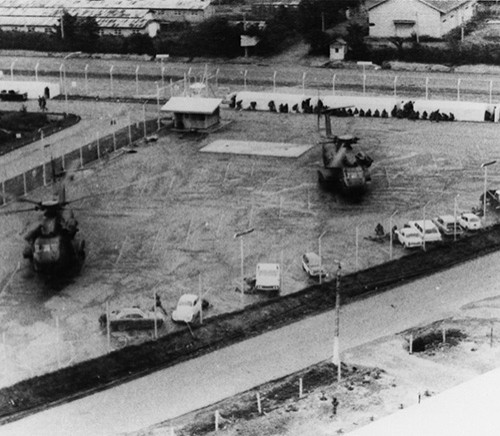 127-GVB-279-A150960:  Operation Frequent Wind, April 29, 1975.   Two Marine CH-53 helicopters set down in a parking lot on the north edge of Saigon during the evacuation.   Official U.S. Marine Corps photograph, now in the collections of the National Archives.   
