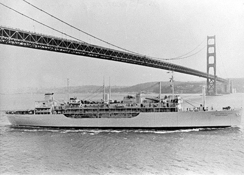 L45-253.02.01:  USS Sanctuary (AH-17) passing underneath the Golden Gate Bridge, San Francisco Bay, California, undated.   NHHC Photograph Collection.  
