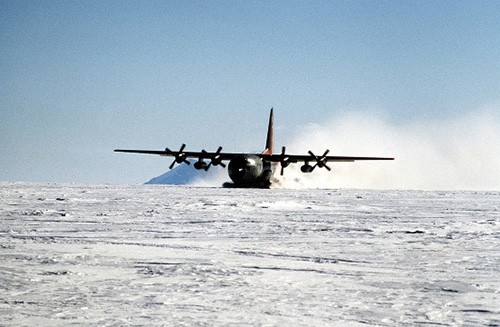 300-CFD-DN-ST-88-07037:   Spreading a wake of blowing snow, a ski-equipped LC-130 Hercules aircraft of Antarctic Development Squadron 6 (VXE-6) taxis for takeoff after leaving scientists at a remote camp during Operation Deep Freeze.   Photographed by JO2 Mike McKinley, 15 June 1988.     Official U.S. Navy photograph, now in the collections of the National Archives.  
