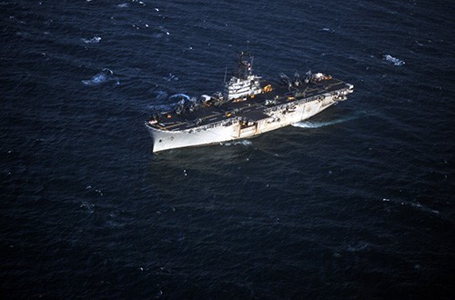 330-CFD-DN-ST-88-05672:   USS Guadalcanal (LPH-7), an aerial port view of the amphibious assault ship, November 1, 1987.    Photographed by PH2 Jeff Elliott.  Official U.S. Navy Photograph, now in the collections of the National Archives.  