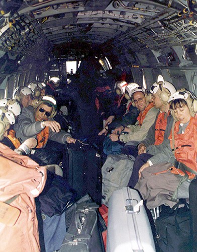 330-CFD-DM-SD-030-01192:  Operation Silver Wake.  American citizens buckle into a CH_46E “Sea Knight” helicopter from 26th Marine Expeditionary Unit for transportation out of Tirana, Albania.   Twenty-Sixth Expeditionary Unit Marines were called upon to perform a Non-Combatant Evacuation of U.S. citizens that desire to leave Albania.   Photographed by SGT Mark D. Olivia, USMC, March 14, 1997    U.S. Marine Corps photograph, now in the collections of the National Archives.  