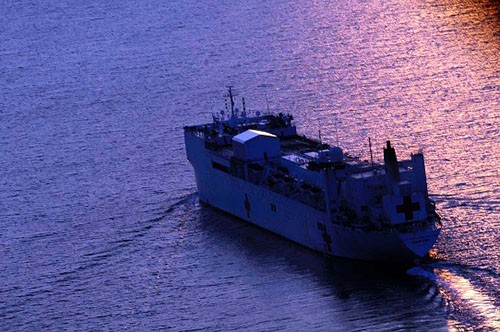 100120-N-4378P-006:   USNS Comfort (T-AH 20) arrives in Port-au-Prince, Haiti, where the combined crew of civilians and Sailors will begin to provide medical care as part of Operation Unified Response. The 1,000-bed hospital ship contains one of the largest trauma facilities in the U.S. and has the capability to provide a full range of medical services to the battered Caribbean nation.   Photography by Edwardo Proano, January 20, 2010.   Official U.S. Navy Photograph.     