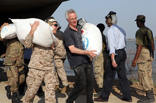 101030-F-0526G-006:   U.S. Ambassador to Pakistan, Cameron R. Munter, center, and Vice Admiral Mike LeFever, commander of the Office of Defense Representative Pakistan, offload bags of flood relief supplies from a U.S. Marine Corps CH-53 Super Stallion helicopter.  Munter visited Pano Aquil to see first-hand the Pakistan and U.S. military flood relief efforts conducted in Sindh Province, Pakistan, as well as to participate in a humanitarian mission bringing relief supplies to flood victims.  The 26th and 15th Marine Expeditionary Units have transported more than 3.7 pounds of relief supplies to 150 different locations in southern Pakistan.  Photographed October 30, 2010 by Staff Sgt. Kali Gradishar.   Official U.S. Air Force Photograph.  