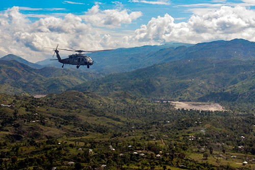 161018-N-RL456-691:   An MH-60S Sea Hawk helicopter assigned to the Dragon Whales of Helicopter Sea Combat Squadron (HSC) 28 approaches the village of Jabouin to deliver food.   Photographed on October 18, 2016 by Petty Officer Second Class Hunter S. Harwell.  Official U.S. Navy photograph.  