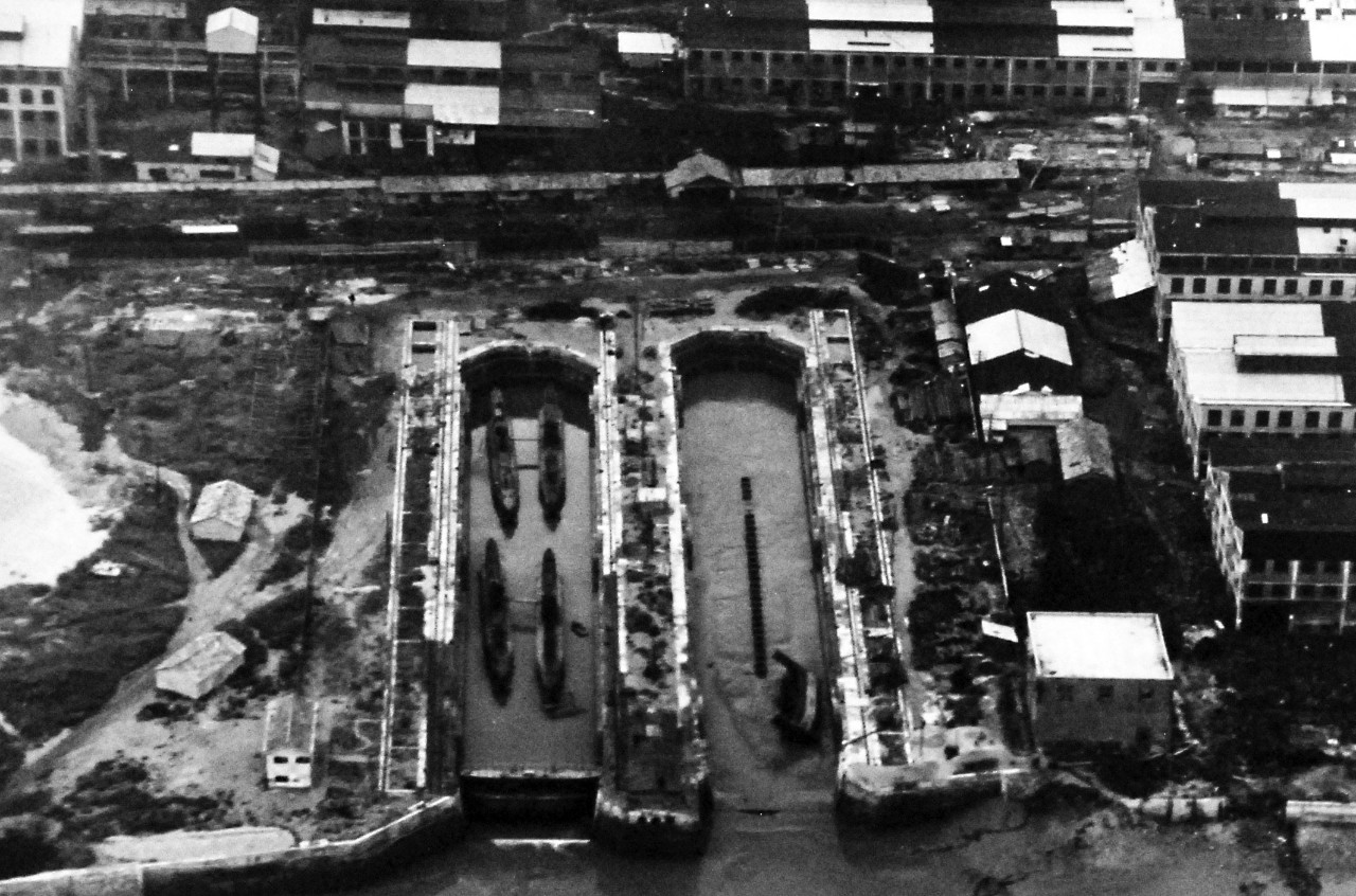 80-G-389978:   Aerial of Inchon, Korea, September 8, 1945.  Four midget submarines in drydock at Jinsen (Inchon), Korea, September 8, 1945.  Photographed by PhoM Sanders.    U.S. Navy photograph, now in the collections of the National Archives.  