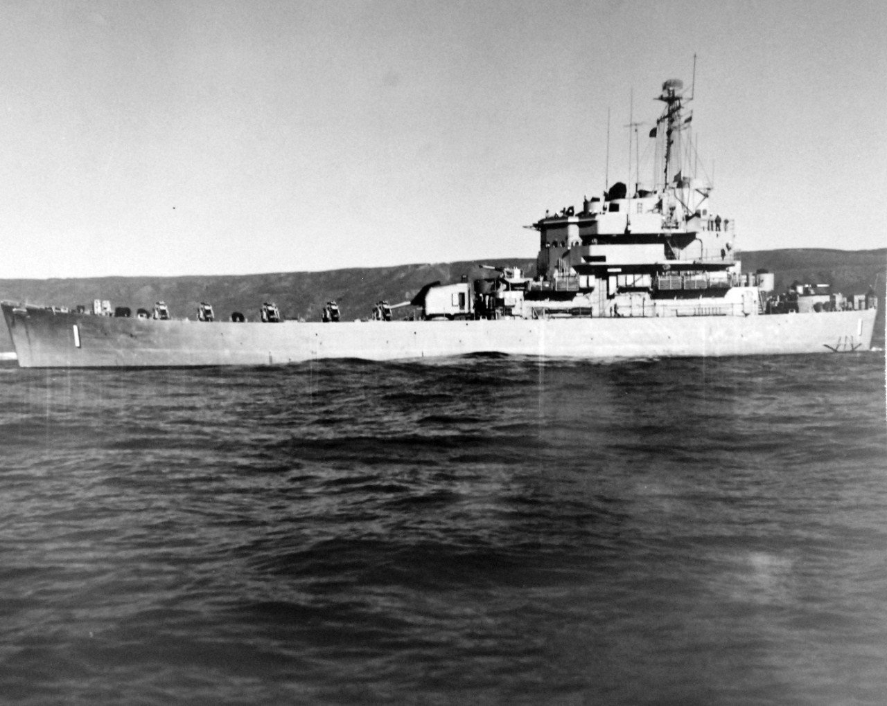 80-G-689754:  USS Carronade (IFS-1), 1955-59.   Carronade was an Inshore Fire Support Ship, built to provide gunfire support to amphibious landings or operations close to shore. Official U.S. Navy Photograph, now in the collections of the National Archives.  (2017/11/01).  Photograph is extremely curved.  
