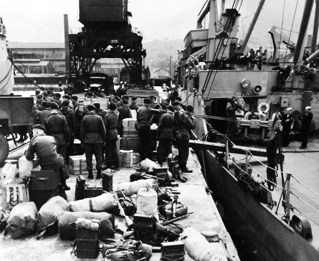USS Fort Marion (LSD-22), 1951.    British Royal Marines load their supplies and equipment on board USS Fort Marion (LSD-22) at Sasebo, Japan, prior to a “Commando Raid” at Sonjin, Korea, to destroy enemy rail and supply lines.  Photograph received May 1951.  Official U.S. Navy Photograph, now in the collections of the National Archives.  (2014/02/20).  