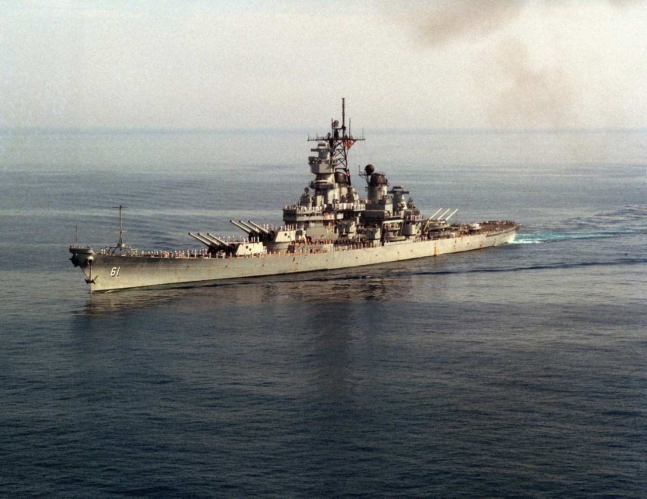 330-CFD-DN-SC-90-11751:  USS Iowa (BB-61), 1987.   A port bow view of the battleship USS Iowa (BB 61) underway, 10/17/1987.  PH3 Michael Skeens, USN.  (OPA-NARA II-2016/01/07). 