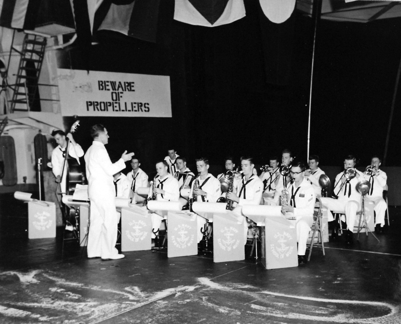 USS Leyte (CV-32), 1949.   Official reception of Vice Admiral Donald B. Duncan, USN, COMSECTASKFLT, on board USS Leyte (CV-32) at Trinidan, B.W.I.   Shown:  Band at reception.     Photograph released March 10, 1949.   Official U.S. Navy photograph, now in the collections of the National Archives.  (2016/11/15).