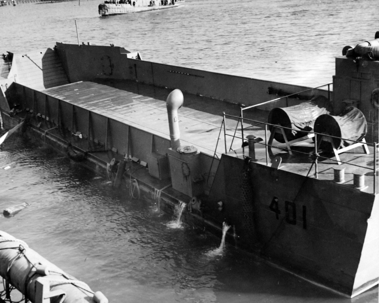 80-G-36269:  USS LST-383, December 1942.  Launching of an LCT-401 over the side of USS LST-383 at Norfolk, Virginia, December 3, 1942.  After launching.  Official U.S. Navy Photograph, now in the collections of the National Archives.  (2017/11/22).  